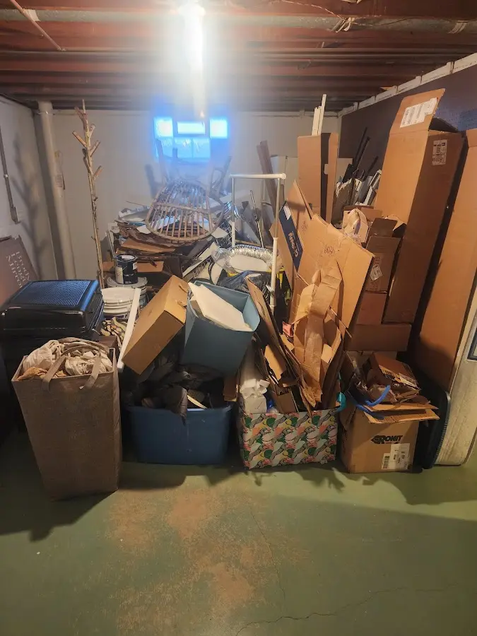 Roll-off dumpster container at job site for 2 Yard Dumpster Rental in Camillus